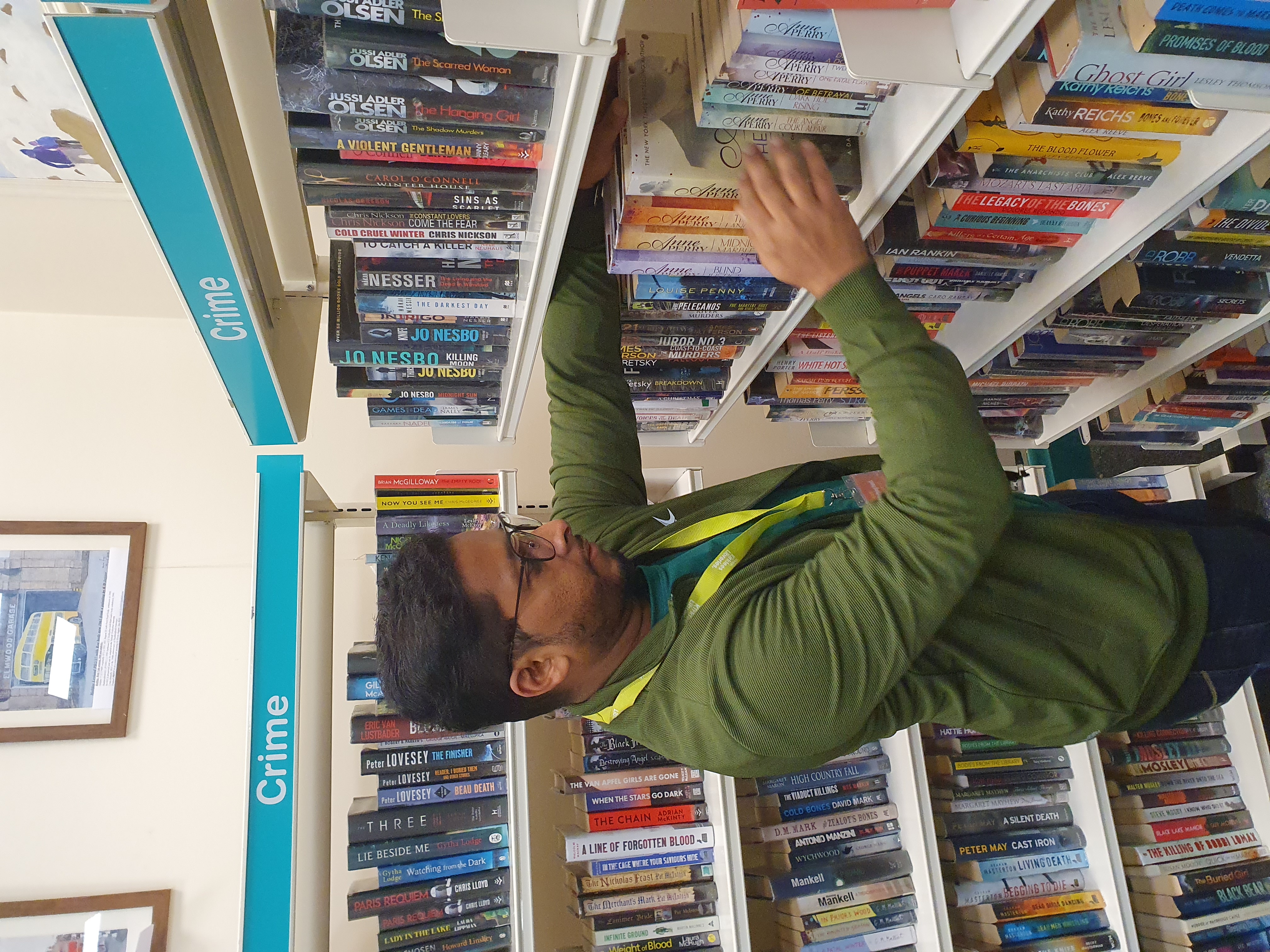 refugee volunteer in the library