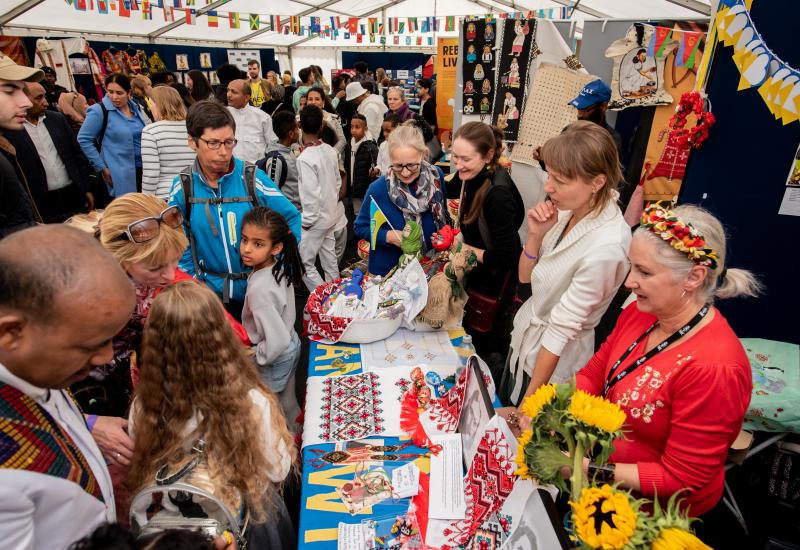 Crowds getting involved in the global village at the Yorkshire Integration Festival 2022